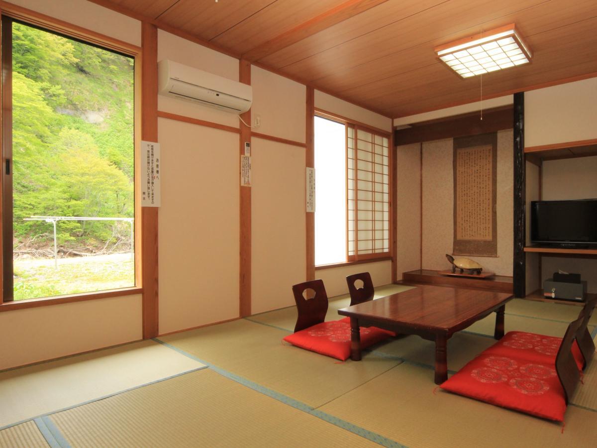 Kiriake Riverside House Hotel Nagano Exterior photo